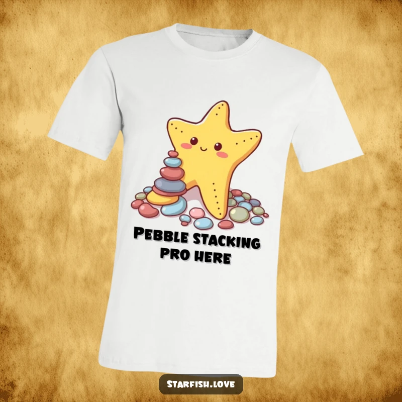 Funny t-shirt featuring a goofy starfish focused intently on stacking small, colorful pebbles, highlighting effort and humorous instability.