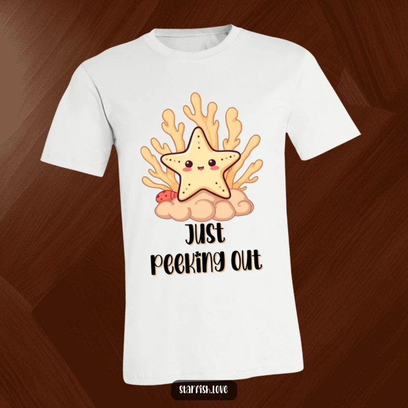 Funny T-Shirt with a shy starfish character peeking from behind a vibrant coral formation, creating a playful scene.