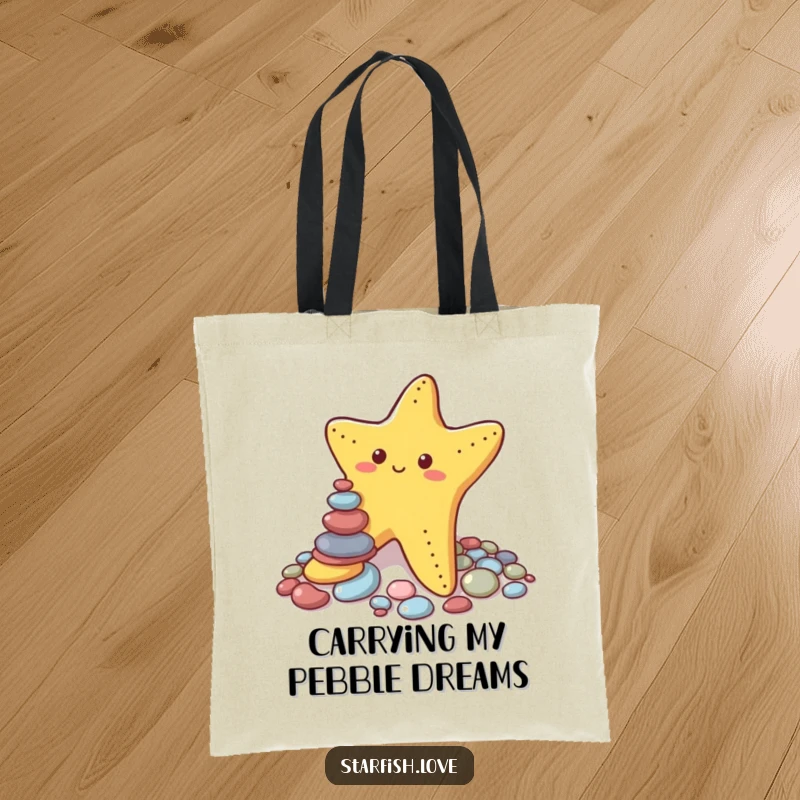 Funny tote bag with a cute starfish trying to stack small, colorful pebbles, conveying a sense of effort and amusing, unsteady accomplishment.