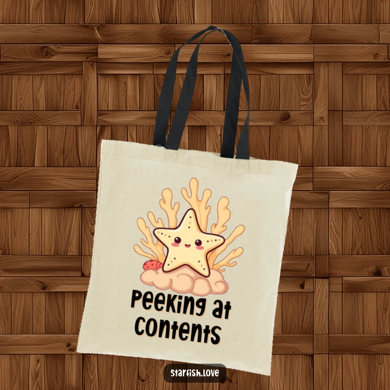 Funny Tote Bag showing a shy starfish character peeking from behind a coral formation, perfect for carrying essentials.